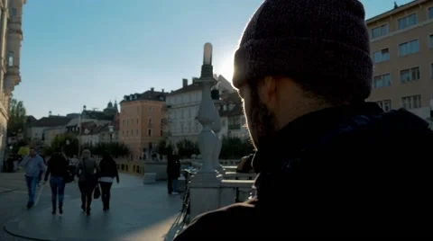 Exploring the city centre a yung man gazes trugh the streets Stock Footage 56242678