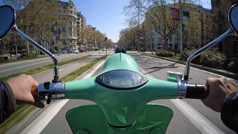 Exploring city on rented electric scooter Stock Footage