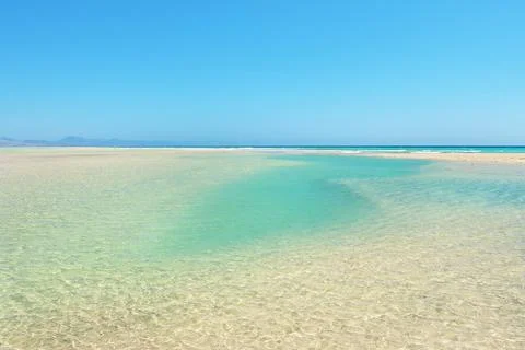 Exploring the clear waters and sandy shores of Sotavento Beach in Fuerteventura Stock Photos