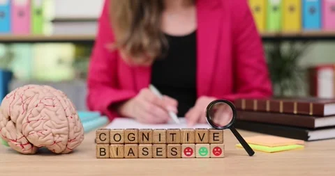 Exploring cognitive biases in a vibrant study setting while writing notes with Stock Footage 320532464