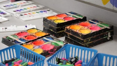 Exploring color palettes in an art classroom setup Stock Footage 311944402