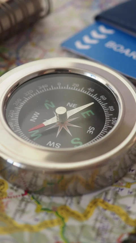 Exploring with a compass and map on an outdoor adventure Stock Footage 318864771