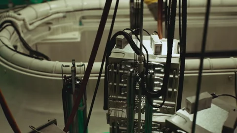 Exploring Complex Machinery in an Advanced Technology Lab Environment Stock Footage 348695354