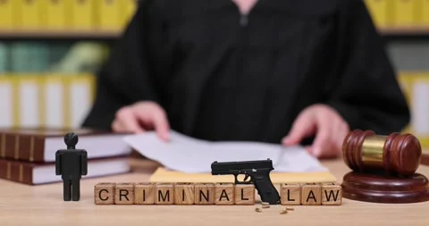 Exploring the complexities of criminal law in a bustling courtroom environment Video stock 320621792