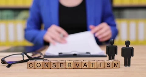 Exploring conservatism through thoughtful analysis and discussion in a modern Stock Footage 319748911
