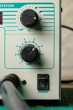 Exploring the controls of a heat station for creative projects Stock Photos