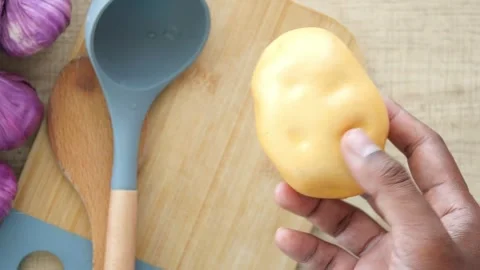 Exploring cooking techniques with fresh ingredients in the kitchen Stock Footage 308853920