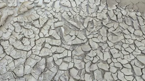 Exploring the Cracked Earth Texture A Study of Drought Patterns and Natural Stock Photos
