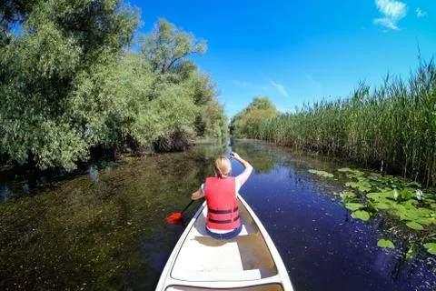 Exploring Danube Delta in Canoe Stock Photos