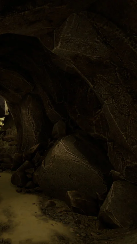 Exploring a dark cave with rocks and shadows during evening light Stock Footage 332209874