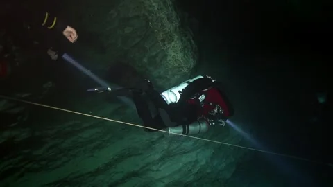 Exploring the depths of flooded caves beneath Budapest Video stock 312078529