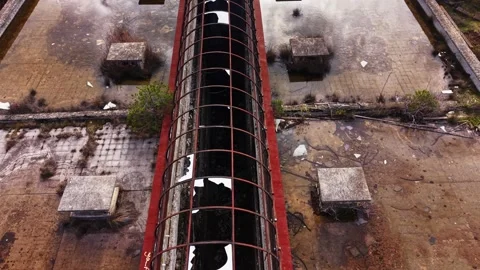 Exploring a deserted structure surrounded by nature in a quiet location Stock Footage 327144018