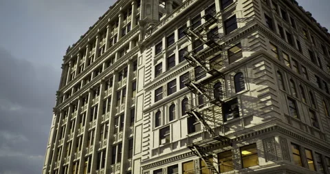 Exploring the detailed architecture of an old urban building at twilight Stock Footage 319744438