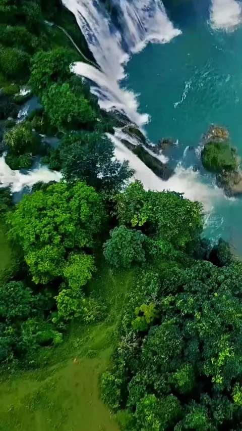 Exploring Detian Waterfall from above in Guangxi China Stock Footage 335074925