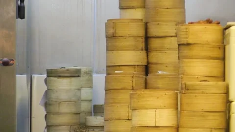 Exploring dim sum preparation in a bustling kitchen Stock Footage 323787341