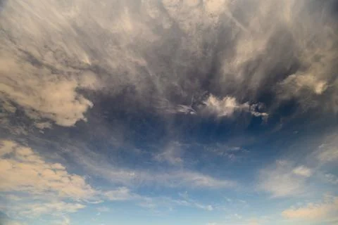 Exploring Dynamic Cloud Patterns that Gracefully Dance Under a Vast and Endless Stock Photos