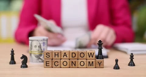 Exploring the dynamics of shadow economy through strategic games and money Stock Footage 318667531