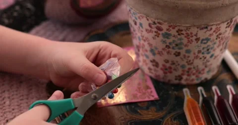 Exploring the egg painting process with fun Easter eggs and stickers for a Stock Footage 306066671