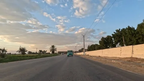 Exploring Egypt open desert while driving along Cairo Fayoum Desert Road highway Stock Footage 330082265