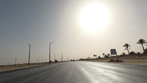 Exploring Egyptian desert while driving along Cairo Fayoum Desert Road highway Stock Footage 329830677