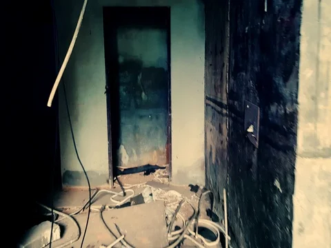 Exploring empty building destroyed by earthquake. Interior of abandoned house Video stock 71380972