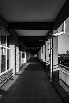 Exploring an empty corridor of a residential building in an urban area Stock Photos