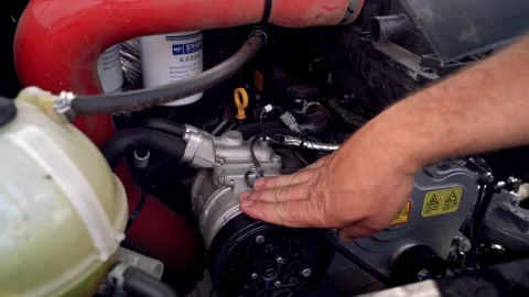 Exploring the engine compartment of a minibus with detailed unit demonstration Stock Footage 328998522
