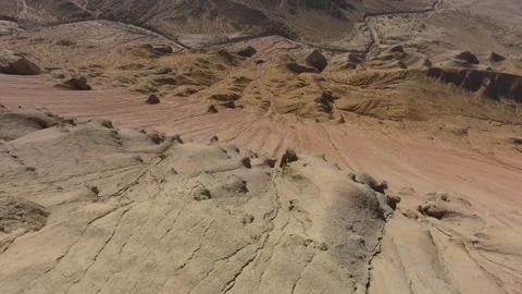 Exploring eroded desert landscape: unveiling nature's canvas Video stock 308951313
