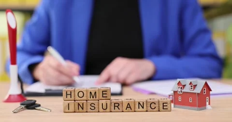 Exploring the essentials of home insurance in a cozy office setting Stock Footage 318660971