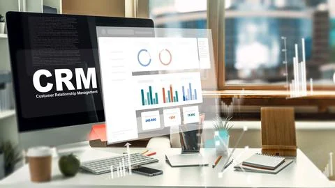 Exploring the features of CRM software in a modern office setup Stock Photos