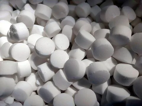 Exploring the Form and Function of Tablet Salt in Culinary Applications Stock Photos