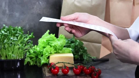 Exploring fresh ingredients in a vibrant kitchen setting Vídeo Stock 296316724