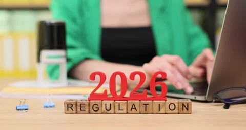Exploring the future of regulation in 2026 through hands-on work at a desk Stock Footage 320475949