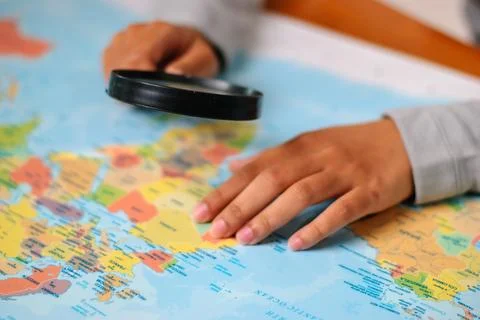 Exploring geographic depth map analysis home office hands- learning close-u.. Stock Photos