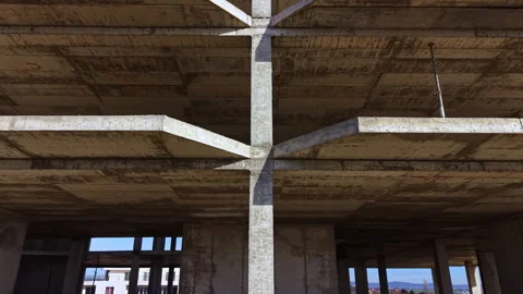 Exploring the geometric beauty of a deserted construction site in soft afternoon Stock Footage 332097461
