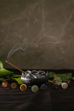 Exploring the harmony of chakras through incense and vibrant symbols Stock Photos