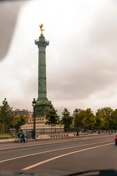 Exploring the historic Place de la Bastille in Paris on a cloudy day Stock Photos