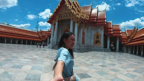 Exploring a Historic Temple with Locals Stock Footage 314456283