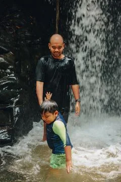 Exploring Indonesia's Refreshing Mini Waterfall (Curug Leuwi Hejo) Stock Photos