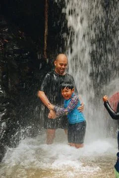 Exploring Indonesia's Refreshing Mini Waterfall (Curug Leuwi Hejo) Stock Photos