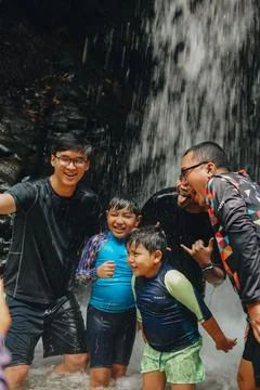 Exploring Indonesia's Refreshing Mini Waterfall (Curug Leuwi Hejo) Stock Photos