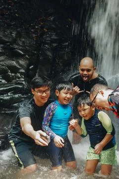 Exploring Indonesia's Refreshing Mini Waterfall (Curug Leuwi Hejo) Stock Photos