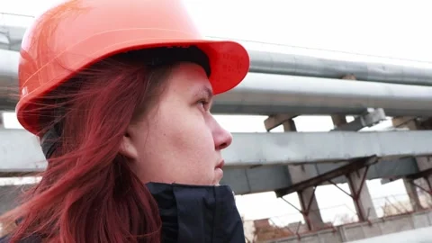Exploring industrial landscapes while wearing safety gear outdoors Stock-Footage 295347469