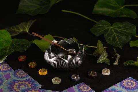 Exploring inner peace through chakras and incense in a serene setting Stock Photos