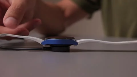 Exploring Innovative Technology Interaction with a Stylish Wireless Device for Stock Footage 313630041