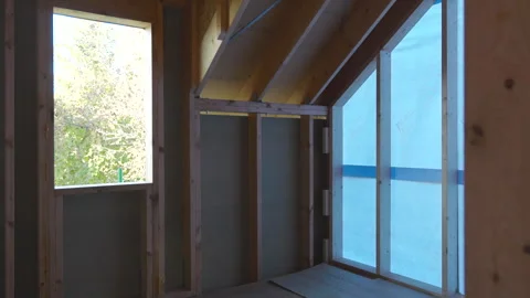Exploring the interior construction of a modern house in a serene setting Stock Footage 301724478