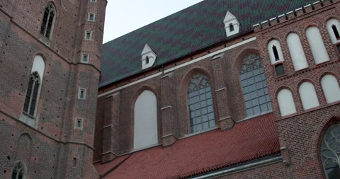 Exploring the intricate architecture of the historic brick cathedral in Poland Stock Footage 283796302