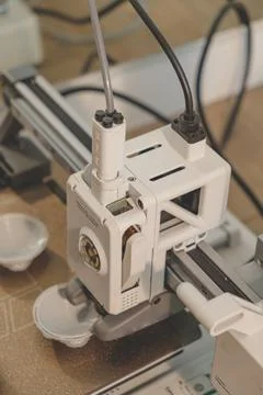 Exploring the intricate design of a 3D printer during a creative project 스톡 사진