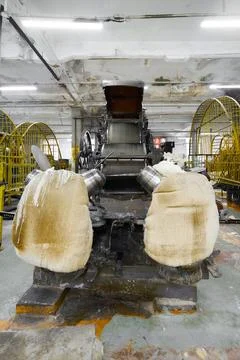 Exploring the intricate design and functionality of a vintage carding machine in 写真素材