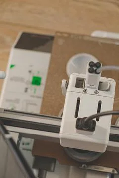 Exploring the intricate details of a 3D printer in action Stock Photos
